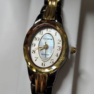 🆕️ Black and gold women's wrist watch
